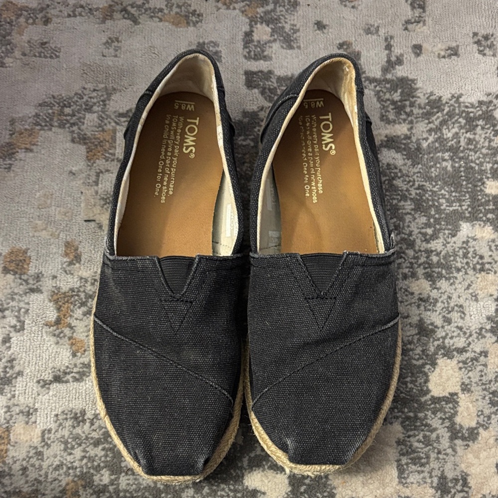 TOMS Black Canvas Slip-Ons